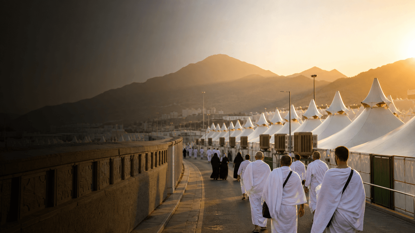 Pilgrims walking through Mina tent city during Hajj